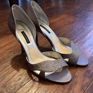 Beautiful silver satin shoes with rhinestones